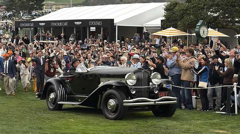 A black Duesenberg SSJ Special Speedster at Pebble Beach