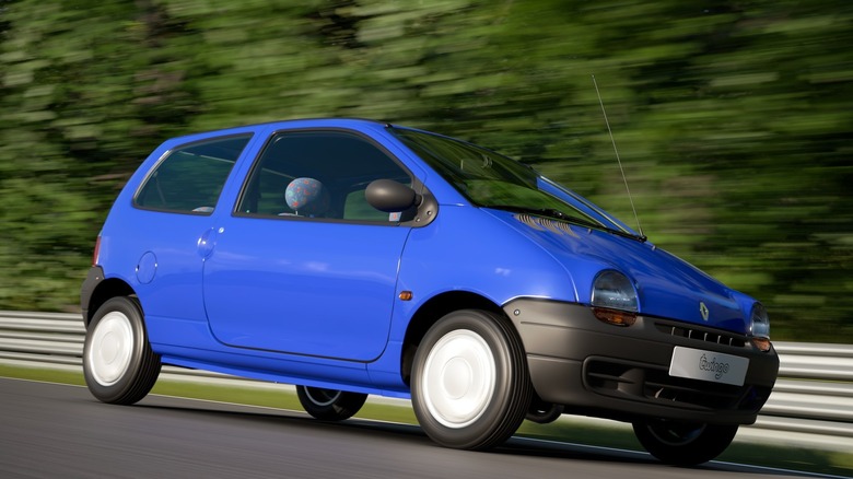A blue Renault Twingo driving in Gran Turismo 7