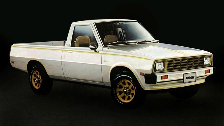 A white Plymouth Arrow pickup on a black background