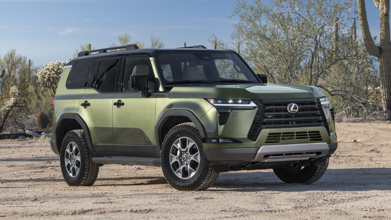 Front 3/4 view of a green Lexus GX