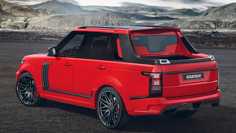 Rear 3/4 view of a red Startech Range Rover pickup