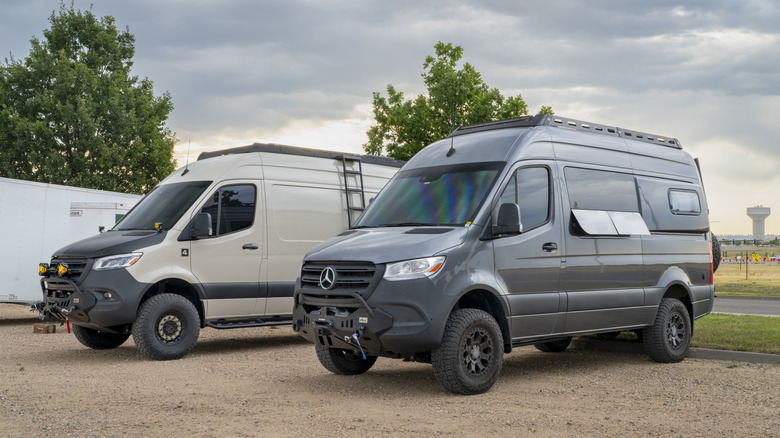Two Mercedes Sprinter camper vans parked
