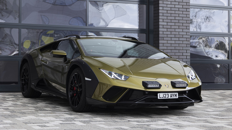 Front 3/4 view of a green Lamborghini Sterrato