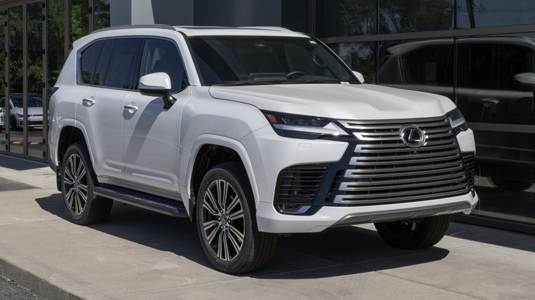 Front 3/4 view of a white Lexus LX