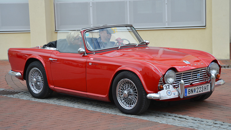 A red Triumph TR4