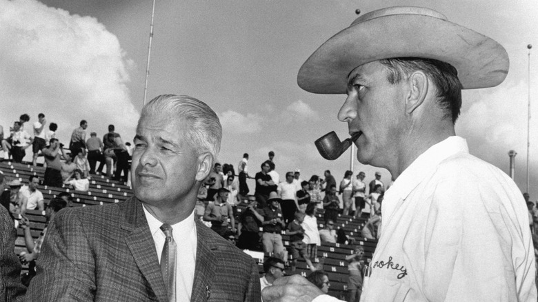 Smokey Yunick with a hat on and a pipe in his mouth