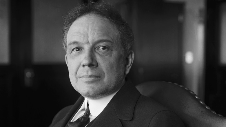 William C. Durant, seated, looking at the camera