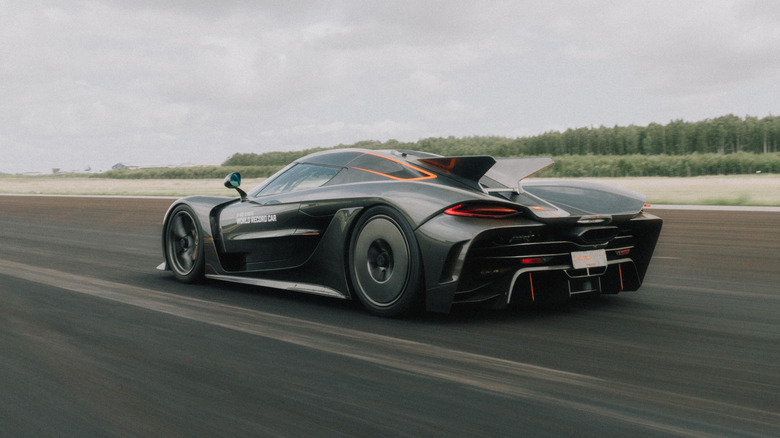 Rear 3/4 view of the Koenigsegg Jesko Absolut record car in motion.