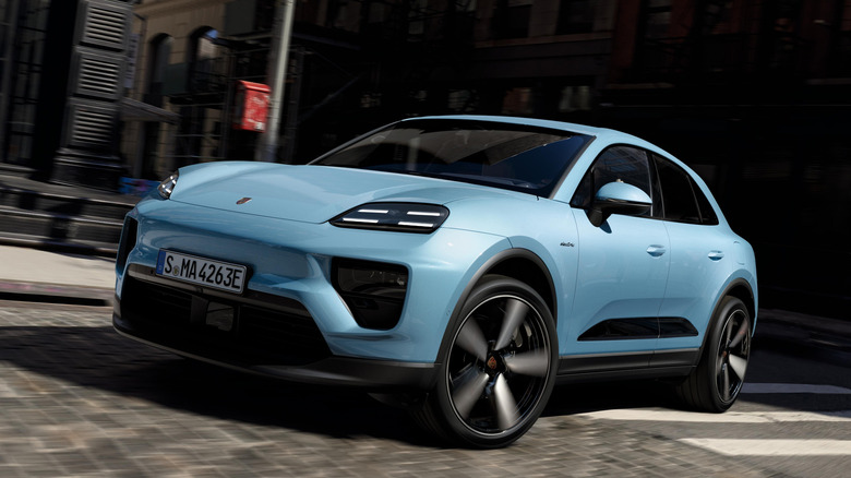 The front 3/4 of 2024 Porsche Macan on city street