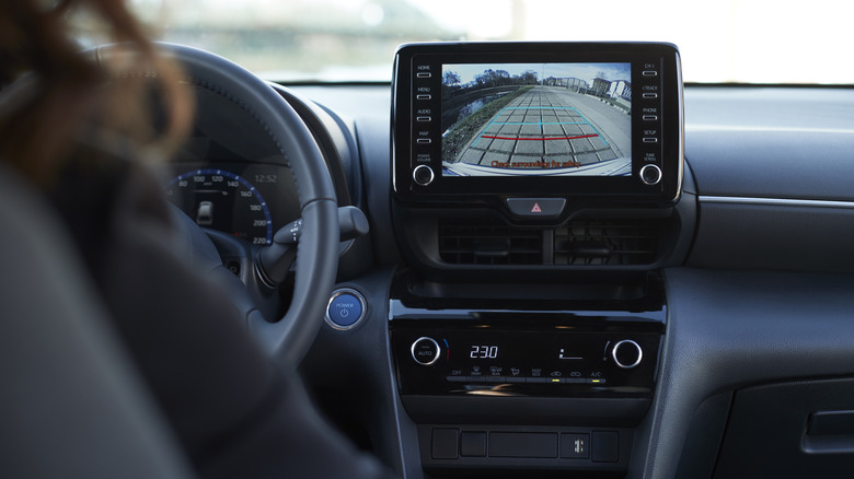 image from a backup camera displayed on a car's center screen