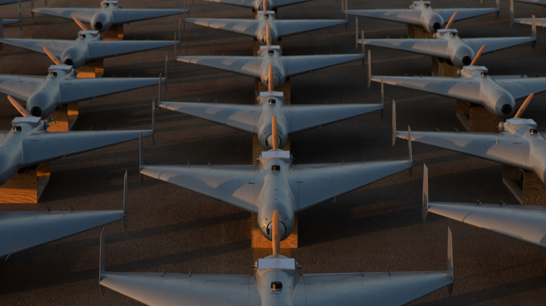 LUCAS drones resting on crates