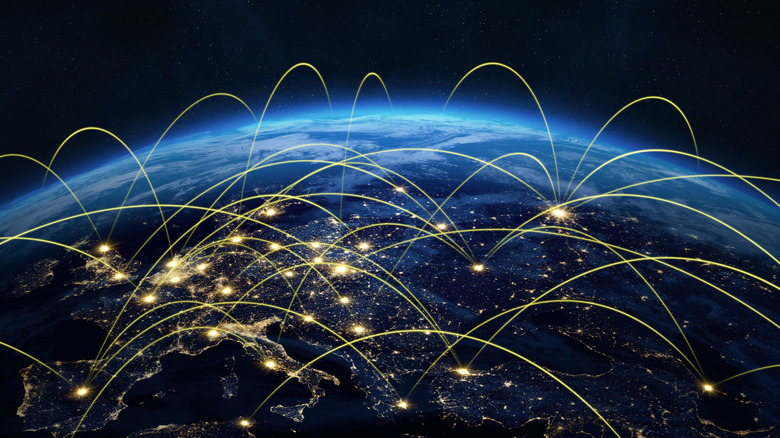 An artist's rendering of satellites in contact with objects on Earth