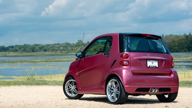 A pink Brabus Smart ForTwo from the rear