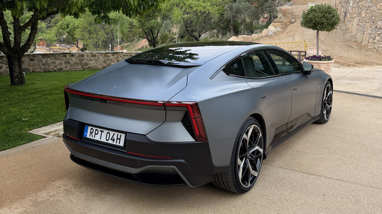 Rear 3/4 view of a matte grey Polestar 5