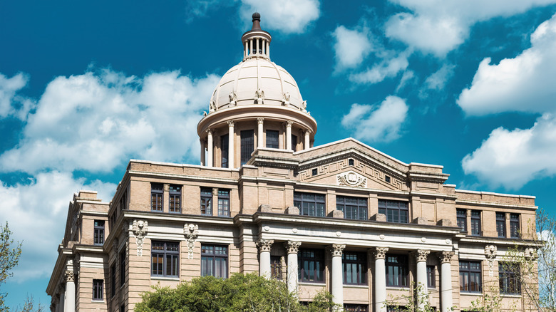 Harris County Courthouse in downtown Houston, Texas, USA on a sunny day.
