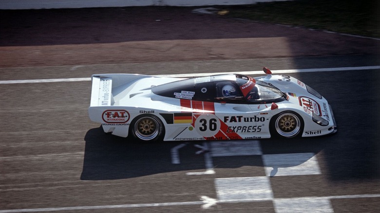 The No. 36 Porsche Dauer 962 crosses the line at the 24 Hours of Le Mans in 1994.