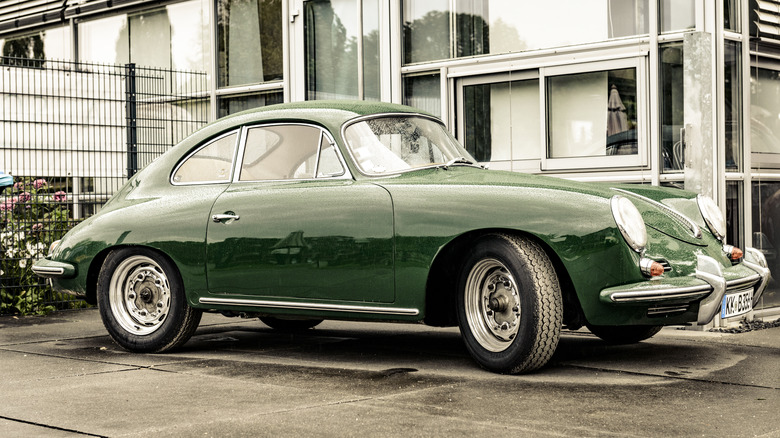 A Porsche 356 Coupe in green.