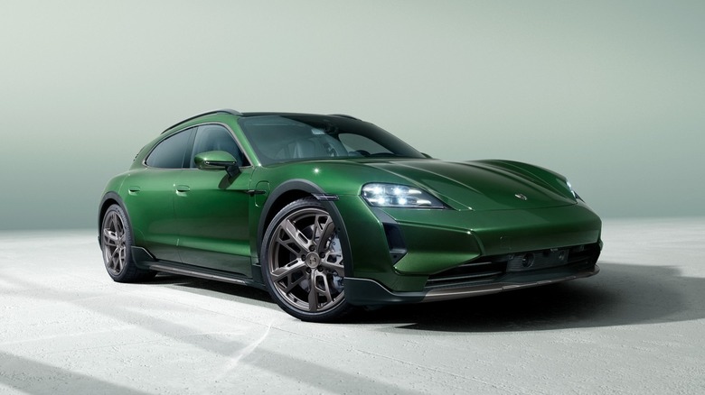 Front 3/4 view of a green Porsche Taycan Turbo S Cross Turismo.