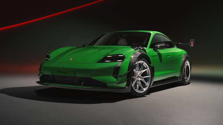 Front 3/4 view of a bright green Porsche Taycan Turbo GT with Manthey Racing kit