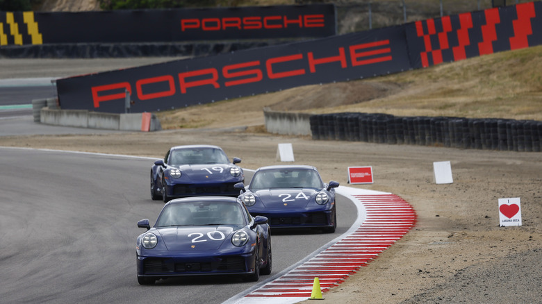 Porsche 911s on track at Laguna Seca