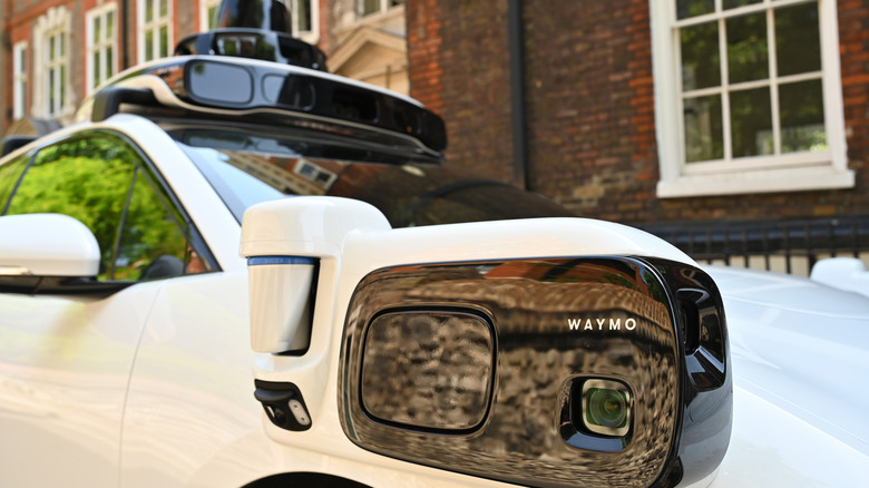 A close up detail of cameras, radar and sensors on a Waymo self-driving all-electric Jaguar i-Pace in Westminster on June 22, 2026 in London, England.