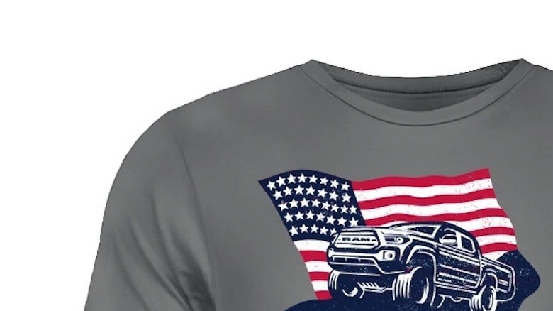 A t-shirt that says "Ram Power" with an American flag and a Toyota Tacoma with a Ram grill