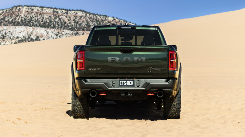 Rear end of a green 2027 Ram 1500 SRT TRX in the desert