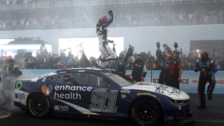 Shane Van Gisbergen, driver of the #91 Enhance Health Chevrolet, celebrates after winning the NASCAR Cup Series Grant Park 220 at the Chicago Street Course on July 02, 2023 in Chicago, Illinois.