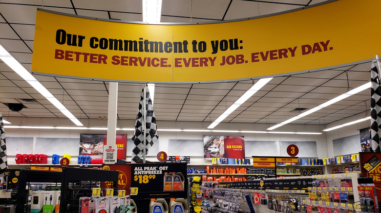 Advance Auto Parts store next to Breaks Plus - View of store, sign hanging from ceiling says 