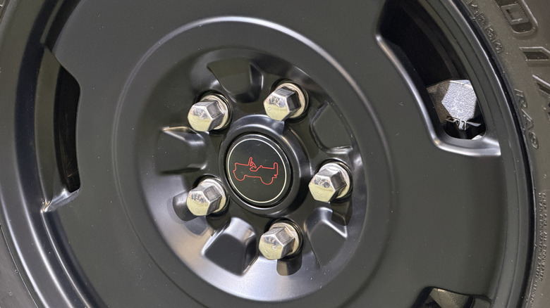 Close-up of a achromatic Jeep wheel