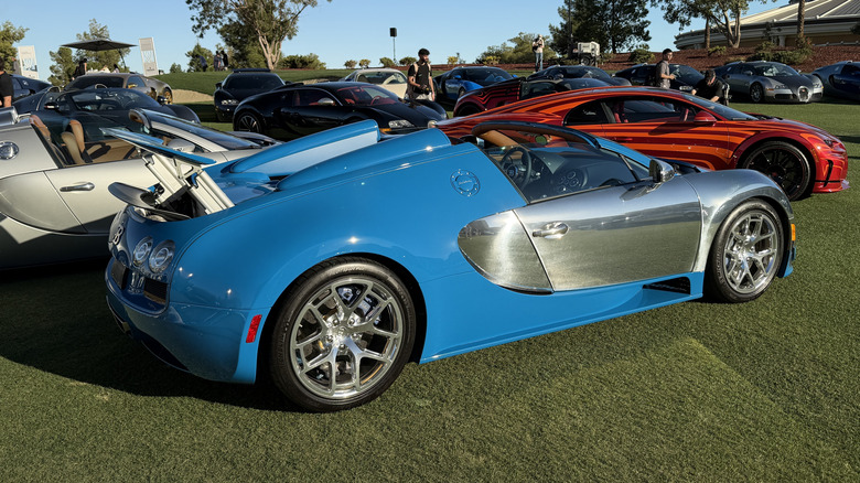 Rear 3/4 position of an aluminum and bluish Bugatti Veyron Grand Sport Vitesse