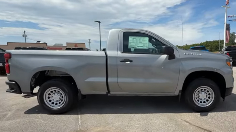 A silver 2026 Chevrolet Silverado 1500 regular cab WT work truck