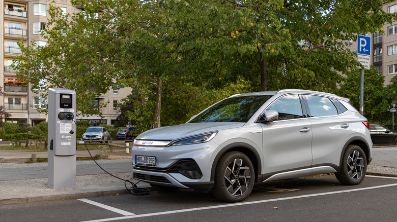 Berlin, Germany - September 24, 2023: A picture of a gray BYD Atto 3 being charged by an E-On electric charging station.