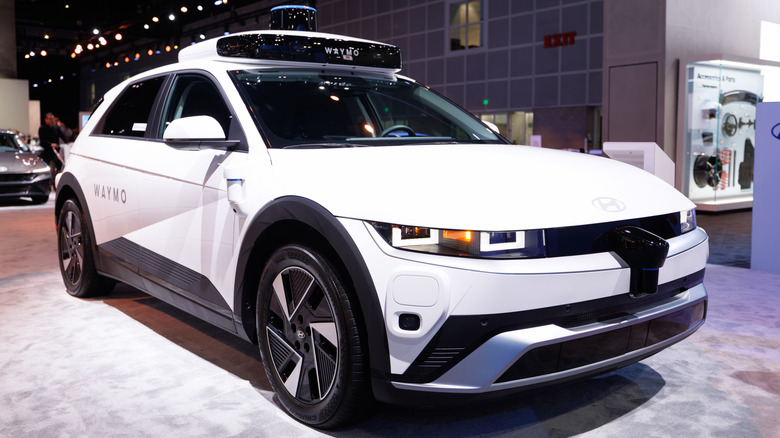 a waymo hyundai Ioniq 5 at an auto show