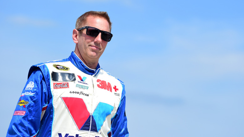 Greg Biffle, who ran practice laps for Kyle Busch, driver of the #51 Cessna Toyota, walks through the garage area during practice for the NASCAR Gander Outdoor Truck Series Vankor 350 at Texas Motor Speedway on March 28, 2019 in Fort Worth, Texas.