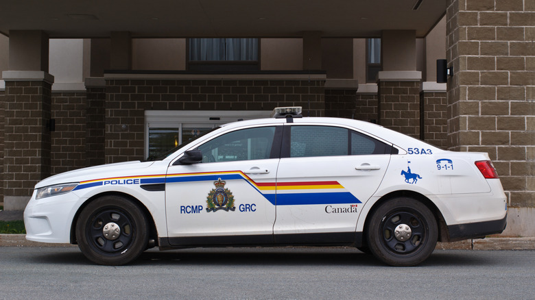 Side view of an RCMP Ford Taurus police car.