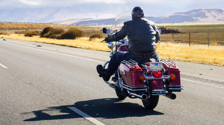A motorcycle rider on a highway