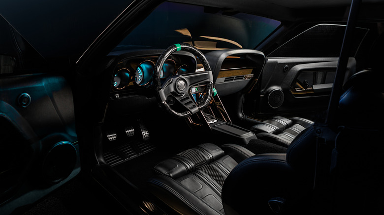 A photo of the dashboard and front seats in Kingpin