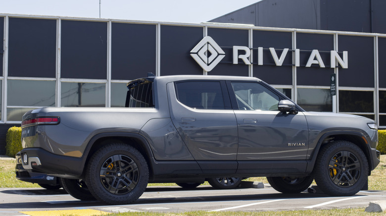 A Rivian RT1 electric truck parked outside of Rivian headquarters