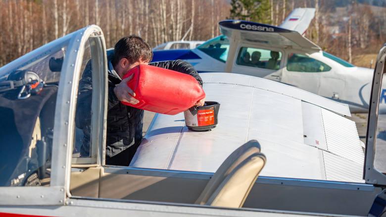 Refueling a light aircraft in Russia from a gas canister