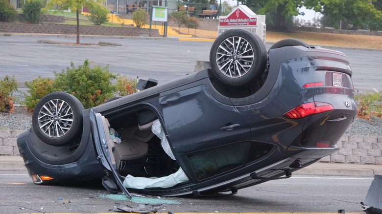 A rolled Hyundai SUV.
