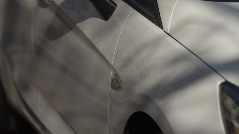 Close-up of a car's front-end body lines