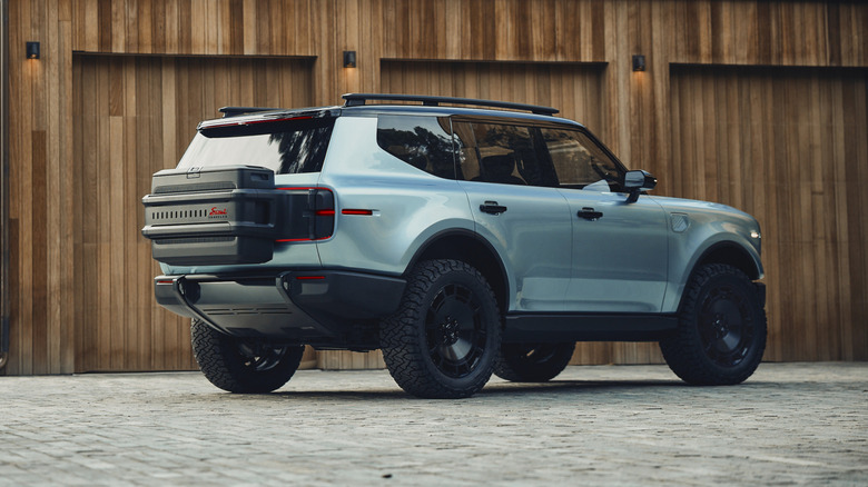 Rear 3/4 view of a blue Scout Traveler concept