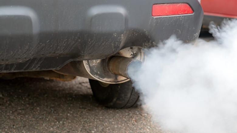 Smoke coming from a car's exhaust pipe