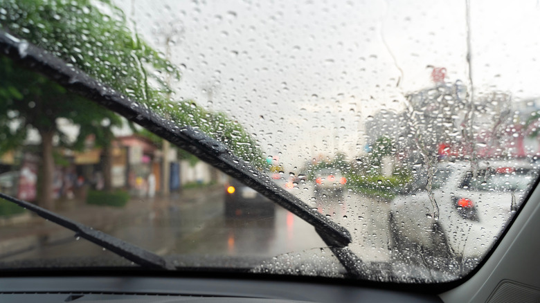 Operating the wipers while driving in the rain
