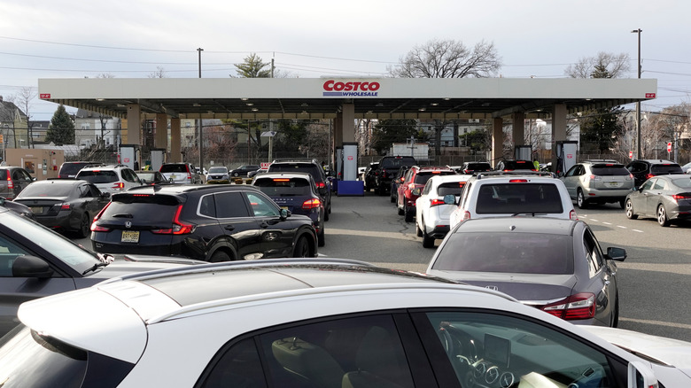Long line of cars at a Costco fuel center