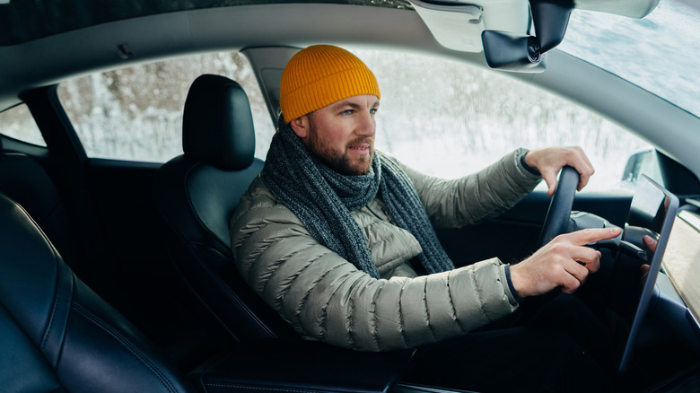 A man using his infotainment screen.