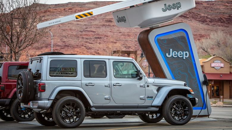 A 2021 Jeep Wrangler 4xe at one of Jeep's proposed trailhead charging stations