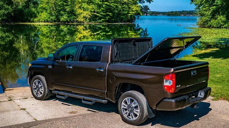 Combination tool box and tonneau cover on a pickup truck