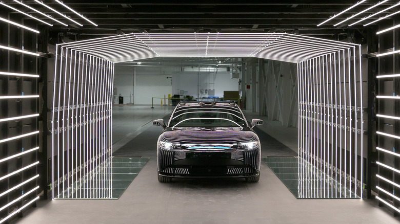 Front end of an Afeela 1 coming through an inspection facility